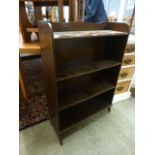An early 20th century ply open bookcase