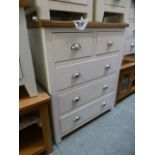 A white painted two over three drawer ch