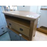 An oak corner TV cabinet with two drawer