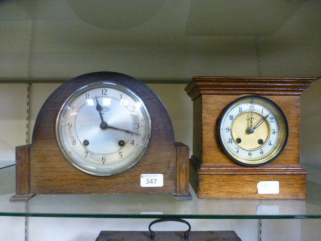 Two early 20th century oak cased mantle