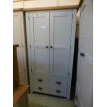 A blue painted two door kitchen larder w