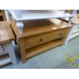 An oak coffee table with four drawers (5