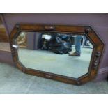 An oak framed mid-20th century wall mirr