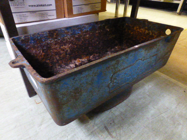 A cast iron toilet cistern by Burlington