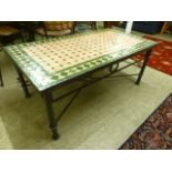 A modern coffee table, the tiled top ove