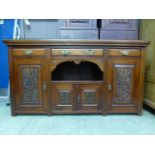 An early 20th century walnut dresser bas