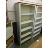 A white open front bookcase (extra.26/10