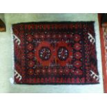 A small red ground rug