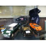 A collection of model cars together with