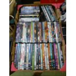 A tray of various DVDs