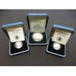 Three silver proof coins comprising of a