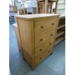 An oak four drawer chest (extra.26/10)
