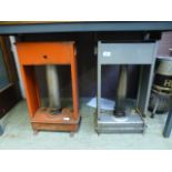 Two glass house paraffin heaters