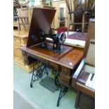 An early 20th century walnut cased tread