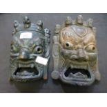 Two south seas carved wooden masks