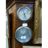 A small banjo barometer by A C Davies St