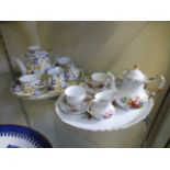 Two miniature ceramic tea sets