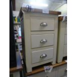 An ivory bedside three drawer cabinet (9