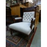 An Edwardian walnut framed salon chair u