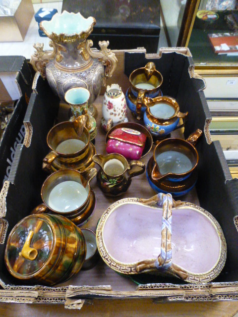 A tray containing ceramic water jugs, bo
