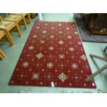 A modern red ground rug