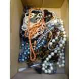 A box of assorted costume jewellery,