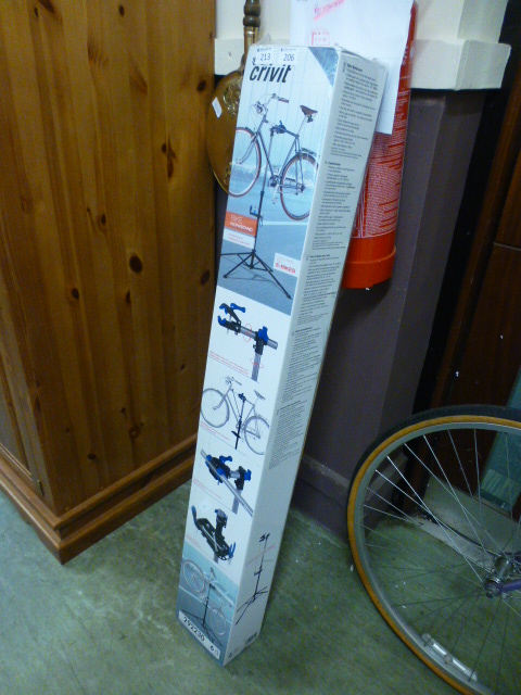 A boxed bike work stand