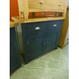 An oak topped and dark grey based cabinet with two drawers over two cupboard doors (15.