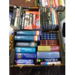 Two trays of assorted books,