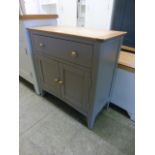 An oak topped grey based cabinet with single drawer over two cupboard doors (28.