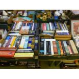 Four trays of hardback books on various subjects