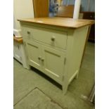 An oak topped side cabinet single drawer over two cupboard doors (37.