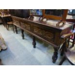 A reproduction early 18th century style oak dresser base,