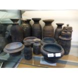 Thirteen eastern wooden vessels,