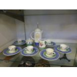 A modern Wedgwood coffee and hot chocolate set comprising of cup, saucers, side plate,
