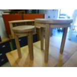 Two circular oak occasional tables (20.
