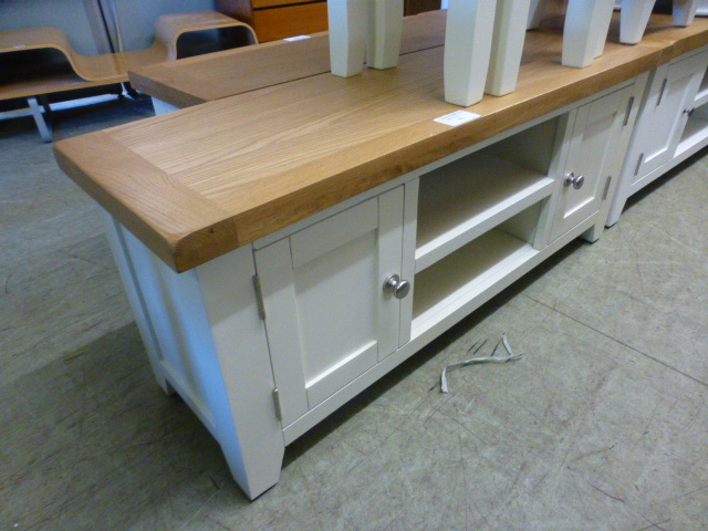 An oak topped grey based media unit (21.