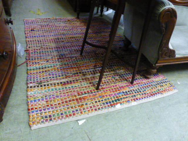 A modern multi coloured wool rug