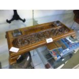 A Victorian oak carved desktop inkstand with two glass inkwells