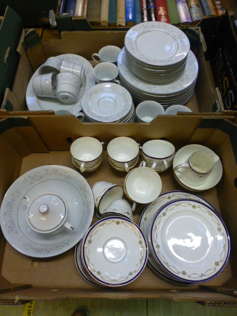 Two trays of ceramic tableware to include cups, saucers, plates etc.