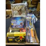 A box of assorted collectibles to include mini, Stanley sports car, 007 etc.