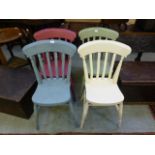 A set of four multi coloured kitchen chairs