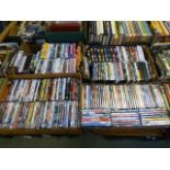 Four trays of DVDs