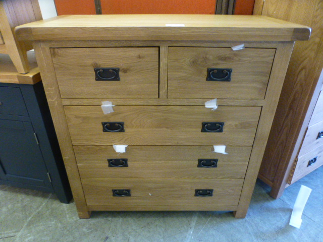 An oak chest of two short over three long drawers (18.14/12) CONDITION REPORT: H.