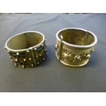 A pair of white metal eastern bangles