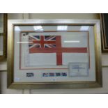 A framed and glazed display of a Royal Naval flag and stamps