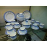 A blue and gilt decorated Royal Worcester tea set comprising of plates, cups, saucers, teapot etc.
