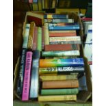 A tray of hardback books,