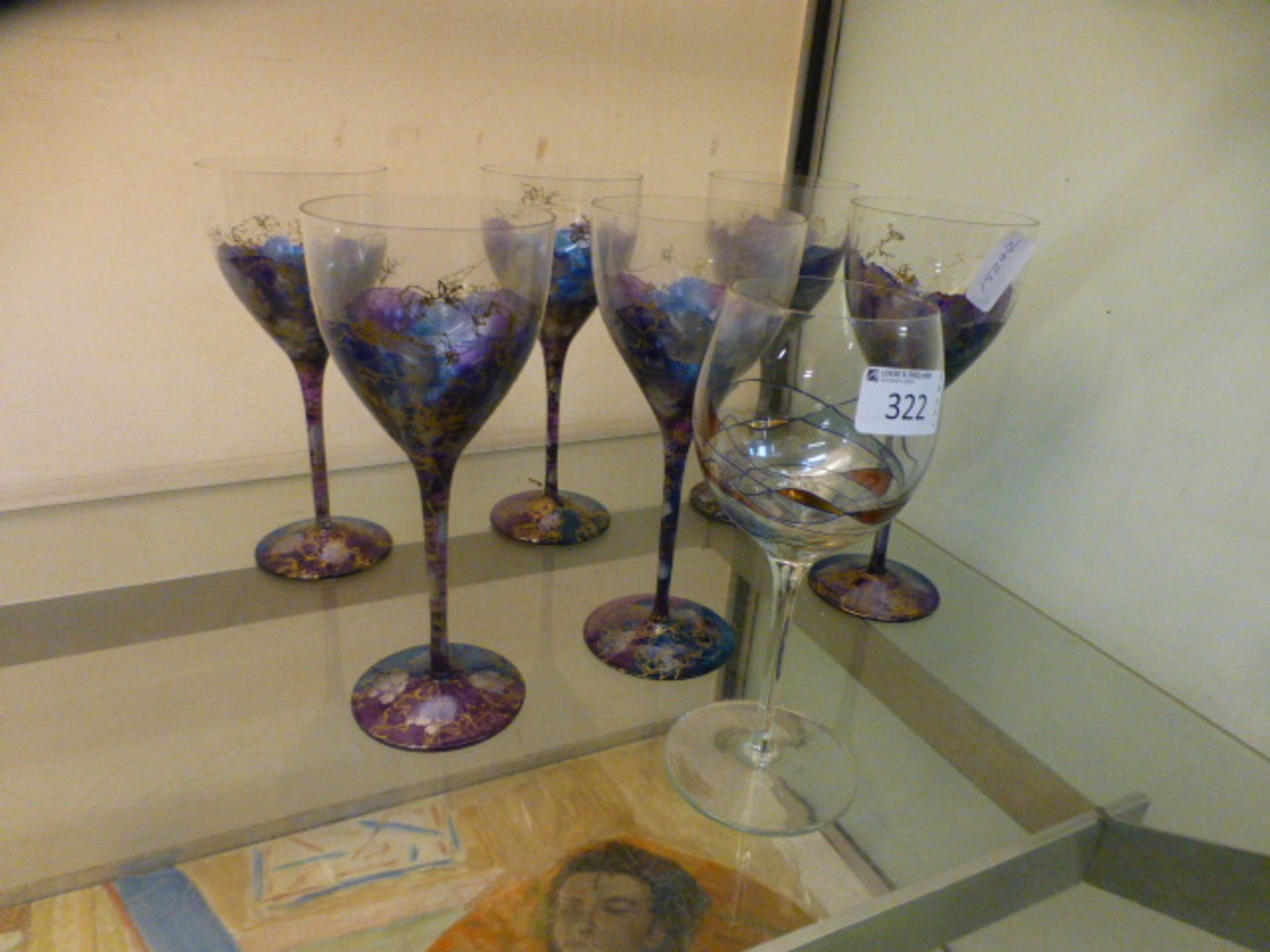 Six plus one coloured wine glasses