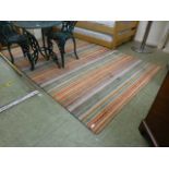 A modern striped multicoloured rug